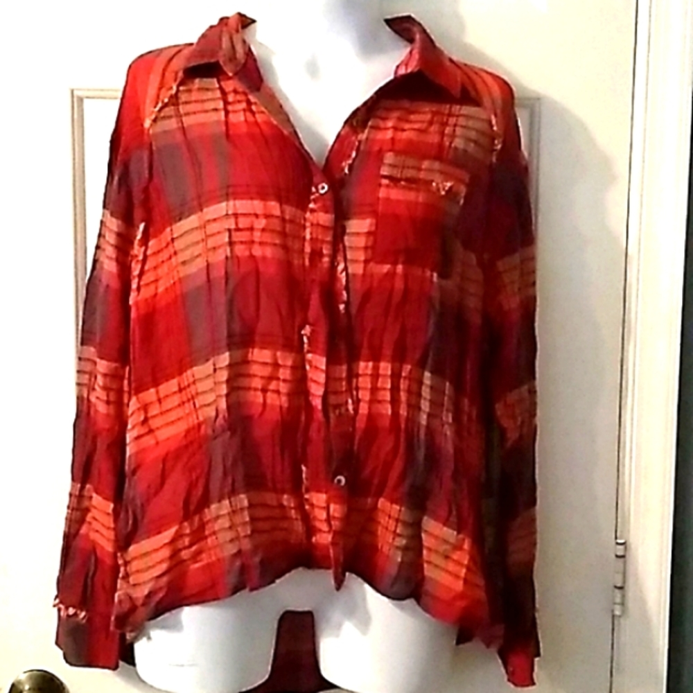 Lightweight Terry style button up blouse.